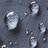 Water droplets on a grey fabric